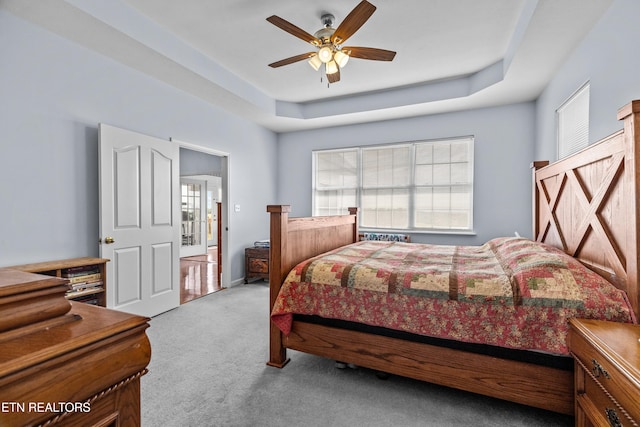 108 Skyline Dr, Dandridge, TN 37725 - carpeted bedroom featuring a tray ceiling and a ceiling fan