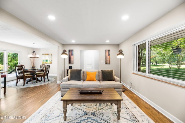 313 Hardwicke Dr, Knoxville, TN 37923 - living room with a chandelier, wood finished floors, and recessed lighting