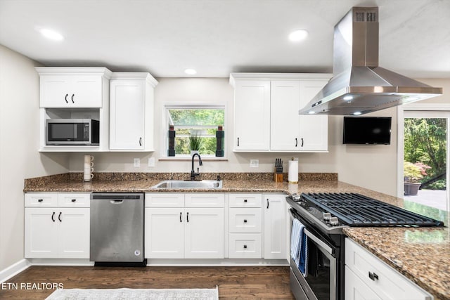 313 Hardwicke Dr, Knoxville, TN 37923 - kitchen with stainless steel appliances, island range hood, dark wood-type flooring, healthy amount of natural light, and recessed lighting