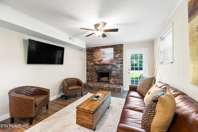 313 Hardwicke Dr, Knoxville, TN 37923 - living area with ceiling fan, wood finished floors, a fireplace, and crown molding
