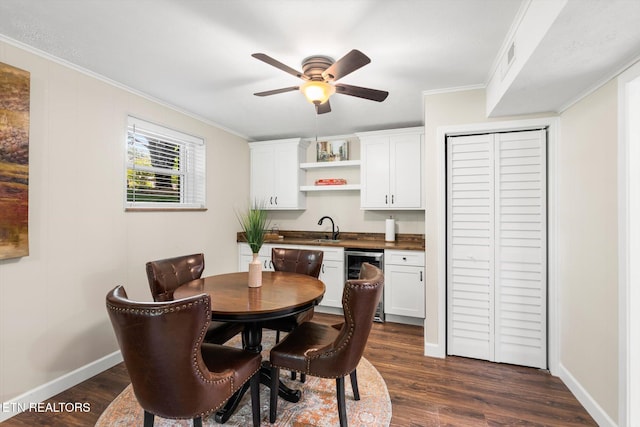 313 Hardwicke Dr, Knoxville, TN 37923 - dining area featuring beverage cooler, ornamental molding, dark wood-style floors, and ceiling fan