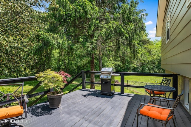 313 Hardwicke Dr, Knoxville, TN 37923 - deck with area for grilling and a lawn
