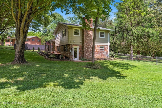 313 Hardwicke Dr, Knoxville, TN 37923 - view of side of property featuring brick siding and a chimney