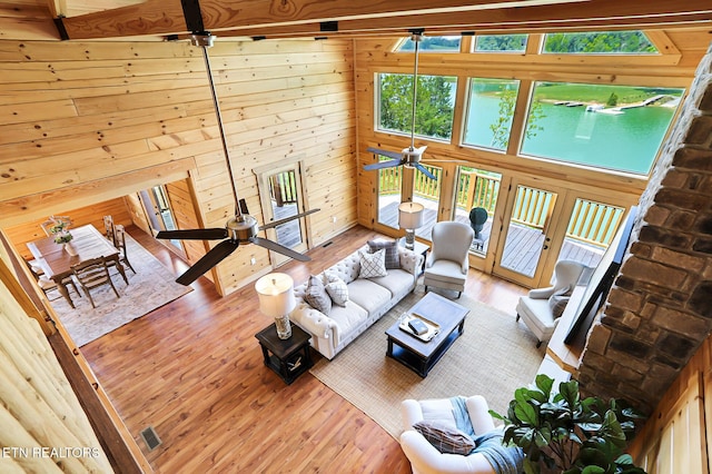 1144 Sanctuary Shores Way, Sevierville, TN 37876 - living room with a ceiling fan, hardwood / wood-style flooring, and wood walls
