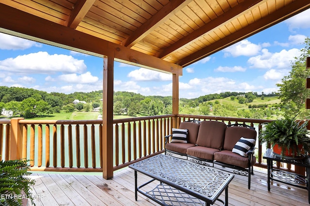 1144 Sanctuary Shores Way, Sevierville, TN 37876 - deck with outdoor lounge area and view of wooded area