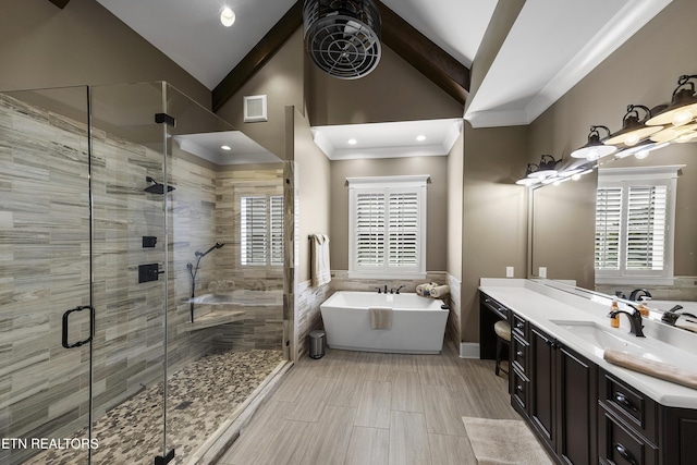 12706 Highwick Cir, Knoxville, TN 37934 - full bath featuring vanity, a soaking tub, a stall shower, vaulted ceiling, and healthy amount of natural light