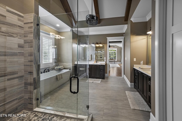 12706 Highwick Cir, Knoxville, TN 37934 - bathroom with two vanities, crown molding, a bath, a stall shower, and recessed lighting