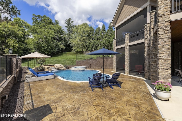 12706 Highwick Cir, Knoxville, TN 37934 - view of pool with a patio, a fenced backyard, a pool with connected hot tub, and view of wooded area