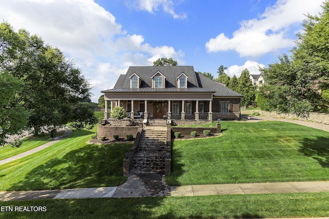 12706 Highwick Cir, Knoxville, TN 37934 - cape cod home with stairs, covered porch, a front lawn, a metal roof, and a standing seam roof