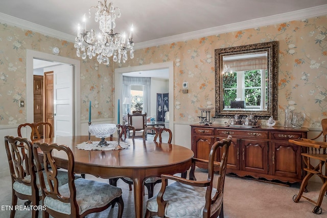 105 N Church St, Sparta, TN 38583 - dining area with a wainscoted wall, a chandelier, wallpapered walls, crown molding, and light colored carpet