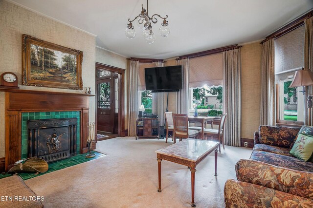 105 N Church St, Sparta, TN 38583 - carpeted living area featuring ornamental molding, a chandelier, and a fireplace