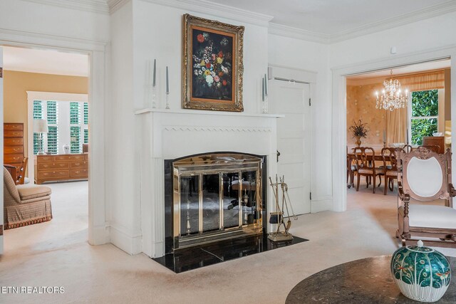 105 N Church St, Sparta, TN 38583 - carpeted living area featuring a chandelier, a fireplace with flush hearth, healthy amount of natural light, and ornamental molding