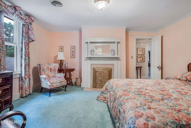 105 N Church St, Sparta, TN 38583 - bedroom featuring crown molding, carpet floors, and a fireplace