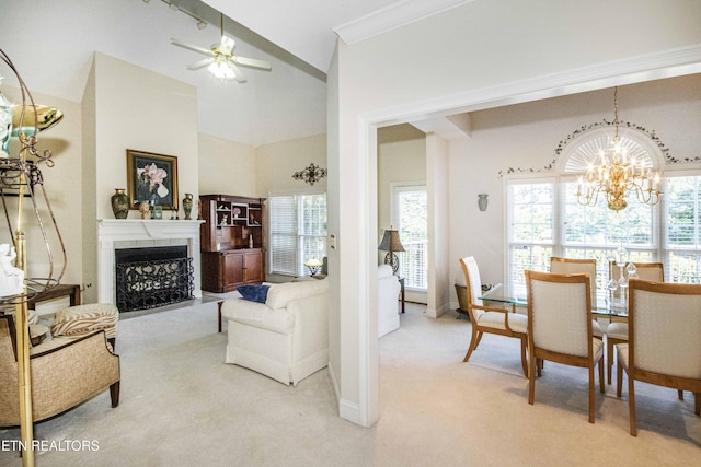 275 Fordham Way, Knoxville, TN 37934 - living area with light colored carpet, a chandelier, lofted ceiling, a fireplace, and healthy amount of natural light