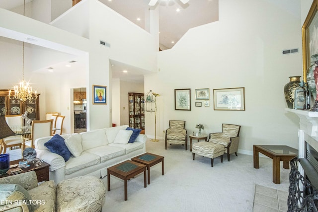275 Fordham Way, Knoxville, TN 37934 - living room with light carpet, high vaulted ceiling, a chandelier, a fireplace, and ceiling fan