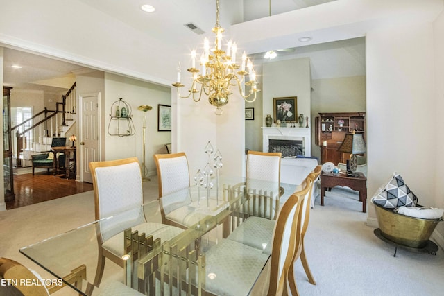 275 Fordham Way, Knoxville, TN 37934 - dining room featuring carpet flooring, stairs, a chandelier, a fireplace, and recessed lighting