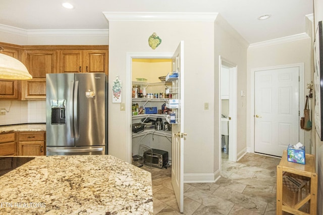 275 Fordham Way, Knoxville, TN 37934 - kitchen featuring stainless steel refrigerator with ice dispenser, ornamental molding, brown cabinets, light stone countertops, and backsplash