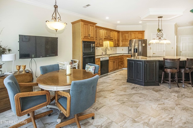 275 Fordham Way, Knoxville, TN 37934 - kitchen with black appliances, ornamental molding, decorative light fixtures, brown cabinetry, and a breakfast bar