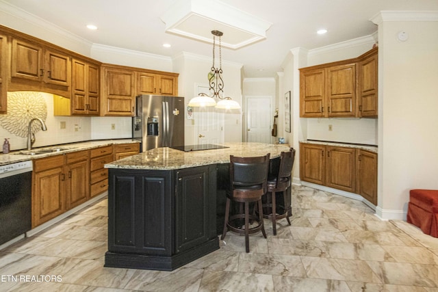 275 Fordham Way, Knoxville, TN 37934 - kitchen featuring black appliances, brown cabinetry, a center island, ornamental molding, and light stone countertops