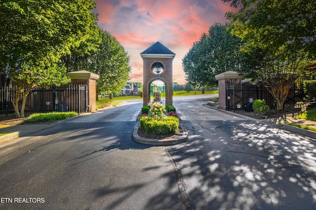 275 Fordham Way, Knoxville, TN 37934 - view of asphalt road featuring curbs and a gated entry