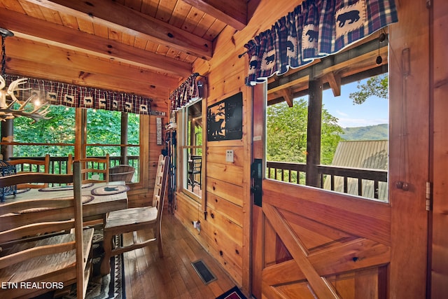 4410 Forest Vista Way, Pigeon Forge, TN 37863 - dining room with hardwood / wood-style floors, wood walls, a wooden ceiling with exposed beams, and a chandelier