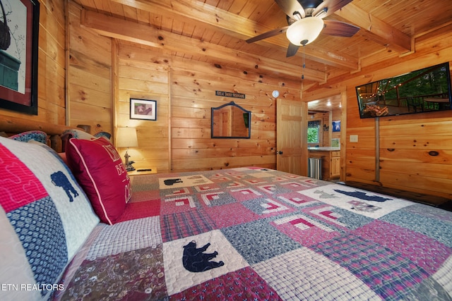 4410 Forest Vista Way, Pigeon Forge, TN 37863 - carpeted bedroom featuring a wood ceiling with exposed beams and wooden walls