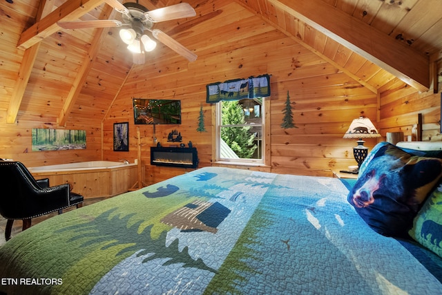 4410 Forest Vista Way, Pigeon Forge, TN 37863 - bedroom featuring wooden ceiling, wood walls, and a glass covered fireplace