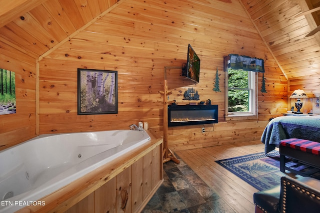 4410 Forest Vista Way, Pigeon Forge, TN 37863 - bedroom featuring lofted ceiling, wooden ceiling, wooden walls, and dark wood-style flooring