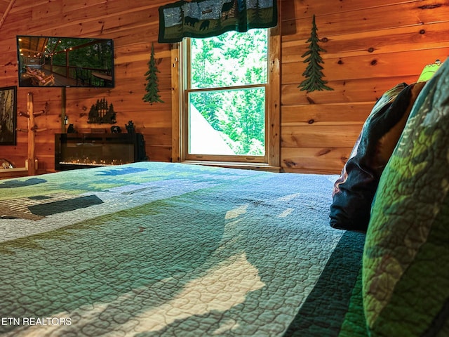 4410 Forest Vista Way, Pigeon Forge, TN 37863 - bedroom featuring multiple windows and wood walls