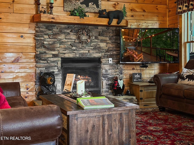 4410 Forest Vista Way, Pigeon Forge, TN 37863 - living area featuring a fireplace and wood walls