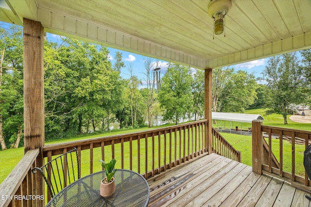 454 Boyd St, Celina, TN 38551 - wooden terrace with a lawn and view of scattered trees