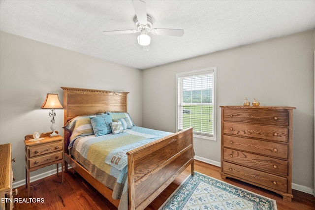 454 Boyd St, Celina, TN 38551 - bedroom with wood finished floors, a textured ceiling, and ceiling fan