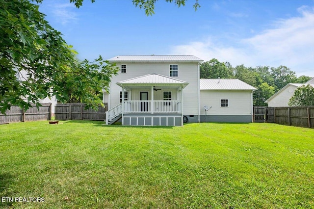 348 Ridge Rd, Caryville, TN 37714 - rear view of house with a fenced backyard, ceiling fan, stairway, and a metal roof
