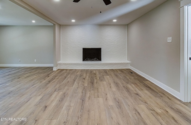 516 Golden Harvest Rd, Knoxville, TN 37934 - unfurnished living room featuring a ceiling fan, wood finished floors, a large fireplace, and recessed lighting
