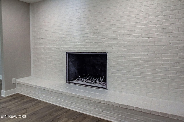 516 Golden Harvest Rd, Knoxville, TN 37934 - detailed view of wood finished floors and a brick fireplace