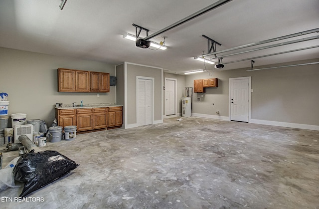 516 Golden Harvest Rd, Knoxville, TN 37934 - garage with electric water heater and a garage door opener