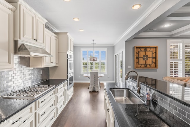 1273 Bishops View Ln, Knoxville, TN 37932 - kitchen with stainless steel appliances, dark wood-style floors, under cabinet range hood, recessed lighting, and decorative backsplash