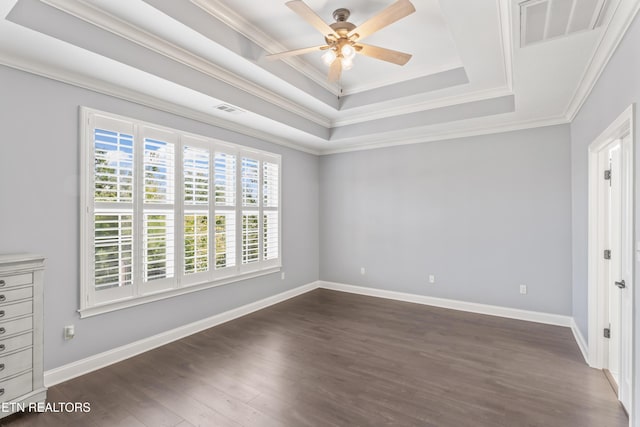 1273 Bishops View Ln, Knoxville, TN 37932 - unfurnished bedroom featuring dark wood finished floors, a tray ceiling, crown molding, and ceiling fan
