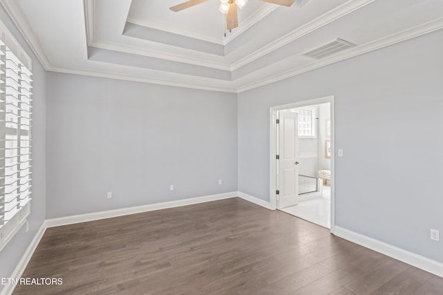 1273 Bishops View Ln, Knoxville, TN 37932 - spare room with ceiling fan, a raised ceiling, wood finished floors, and crown molding