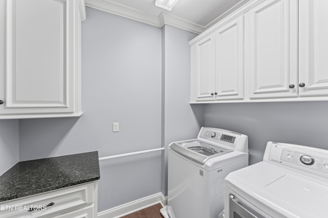 1273 Bishops View Ln, Knoxville, TN 37932 - laundry area featuring crown molding, cabinet space, washing machine and dryer, and dark wood-style flooring