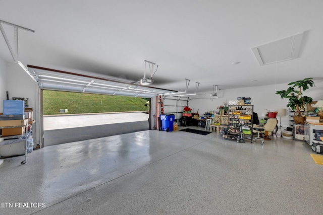 2570 NE Spring Creek Dr, Cleveland, TN 37311 - garage featuring a garage door opener