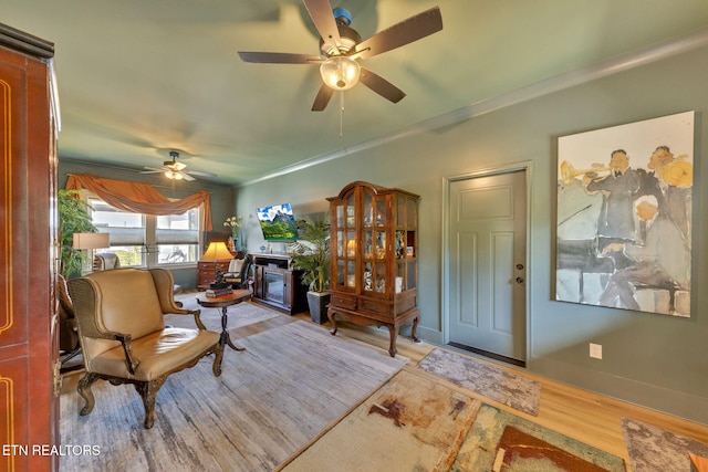 2570 NE Spring Creek Dr, Cleveland, TN 37311 - living area featuring ceiling fan, wood finished floors, and crown molding