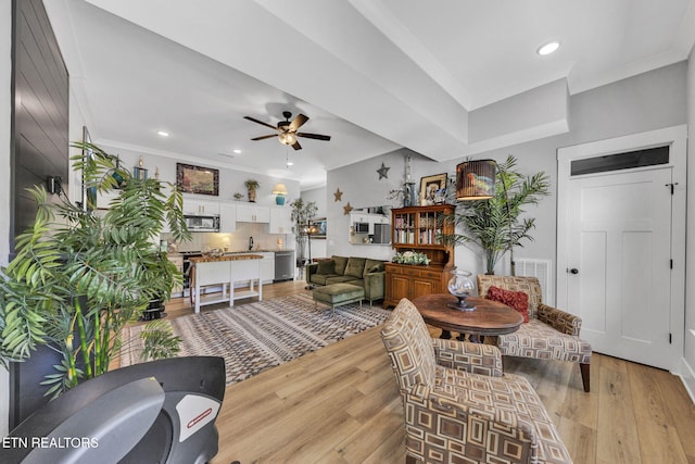 2570 NE Spring Creek Dr, Cleveland, TN 37311 - living room with ceiling fan, light wood-style flooring, crown molding, and recessed lighting