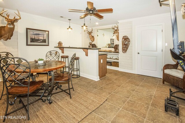 9436 Naff Rd, Heiskell, TN 37754 - tiled dining area featuring a ceiling fan and crown molding