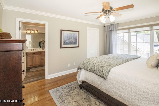 9436 Naff Rd, Heiskell, TN 37754 - bedroom with crown molding, wood finished floors, a ceiling fan, and connected bathroom