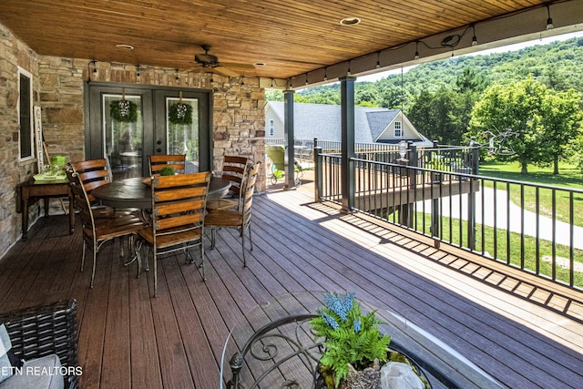 9436 Naff Rd, Heiskell, TN 37754 - wooden terrace with a ceiling fan, french doors, and outdoor dining area