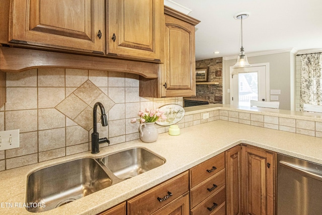 9436 Naff Rd, Heiskell, TN 37754 - kitchen featuring light countertops, decorative backsplash, ornamental molding, hanging light fixtures, and brown cabinetry