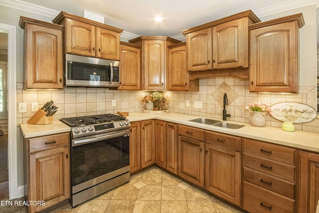 9436 Naff Rd, Heiskell, TN 37754 - kitchen with stainless steel appliances, light countertops, backsplash, and ornamental molding