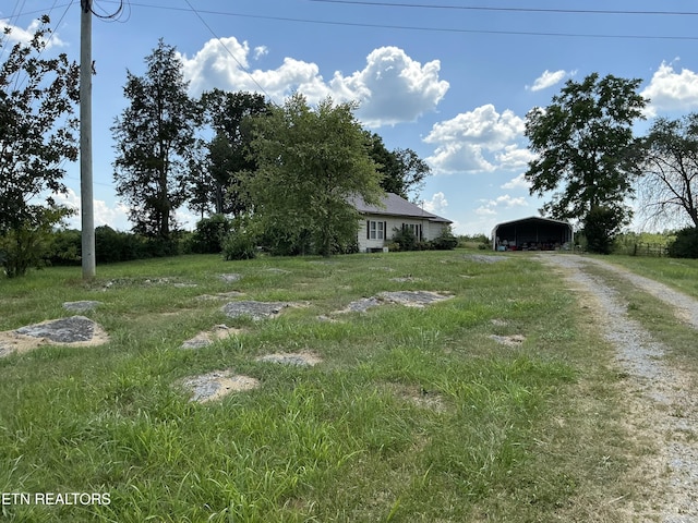 1890 Doaks Creek Rd, Speedwell, TN 37870 - view of front of house with a carport and driveway