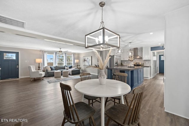750 Everett Rd, Farragut, TN 37934 - dining area featuring ceiling fan, a chandelier, wood finished floors, and recessed lighting